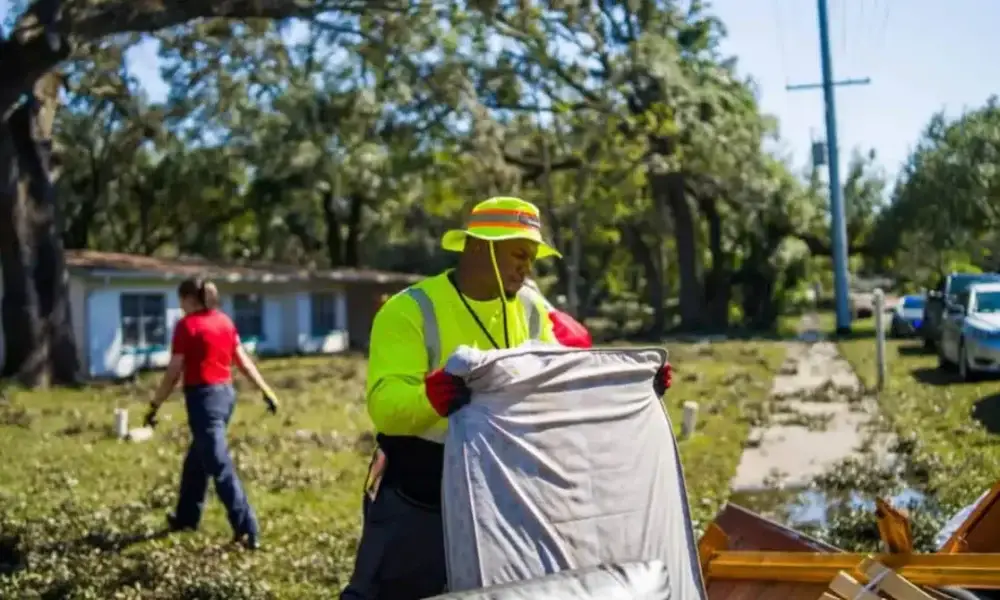 Tampa Workers Remove Debris The Size Of 18 Football Fields Daily After