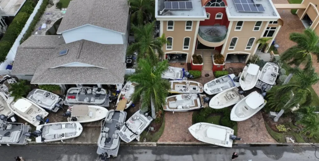 Damaged Tampa Bay home after Hurricane Helene with rising waters
