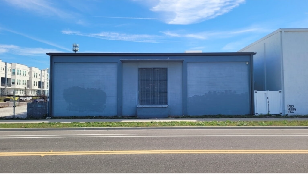 Travis Kaiser smiling outside Santoro’s in Tampa