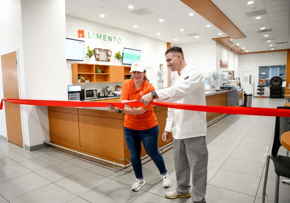 Alimento Tampa Latin restaurant interior showing authentic decor and open kitchen at Jerry Ulm Dealership location