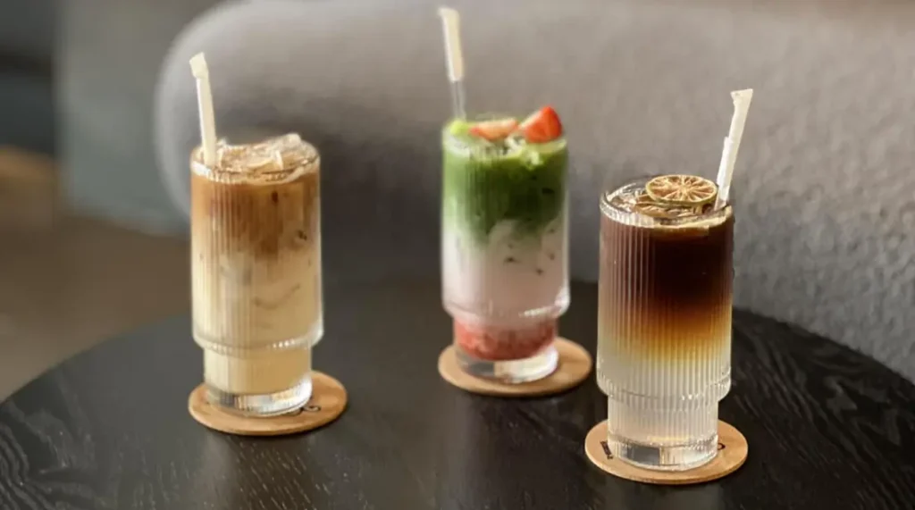 Mango matcha latte at Sorbo Wesley Chapel with mango garnish