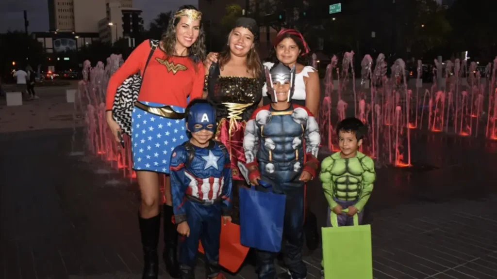 Halloween celebration at Tampa Riverwalk with costumes and candy